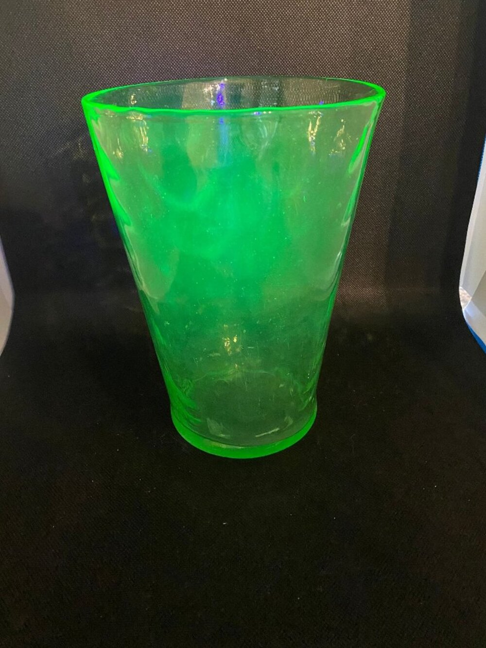 UV Vase. Has some splotchy spots from time and usage. Beautiful glow and it’s qu